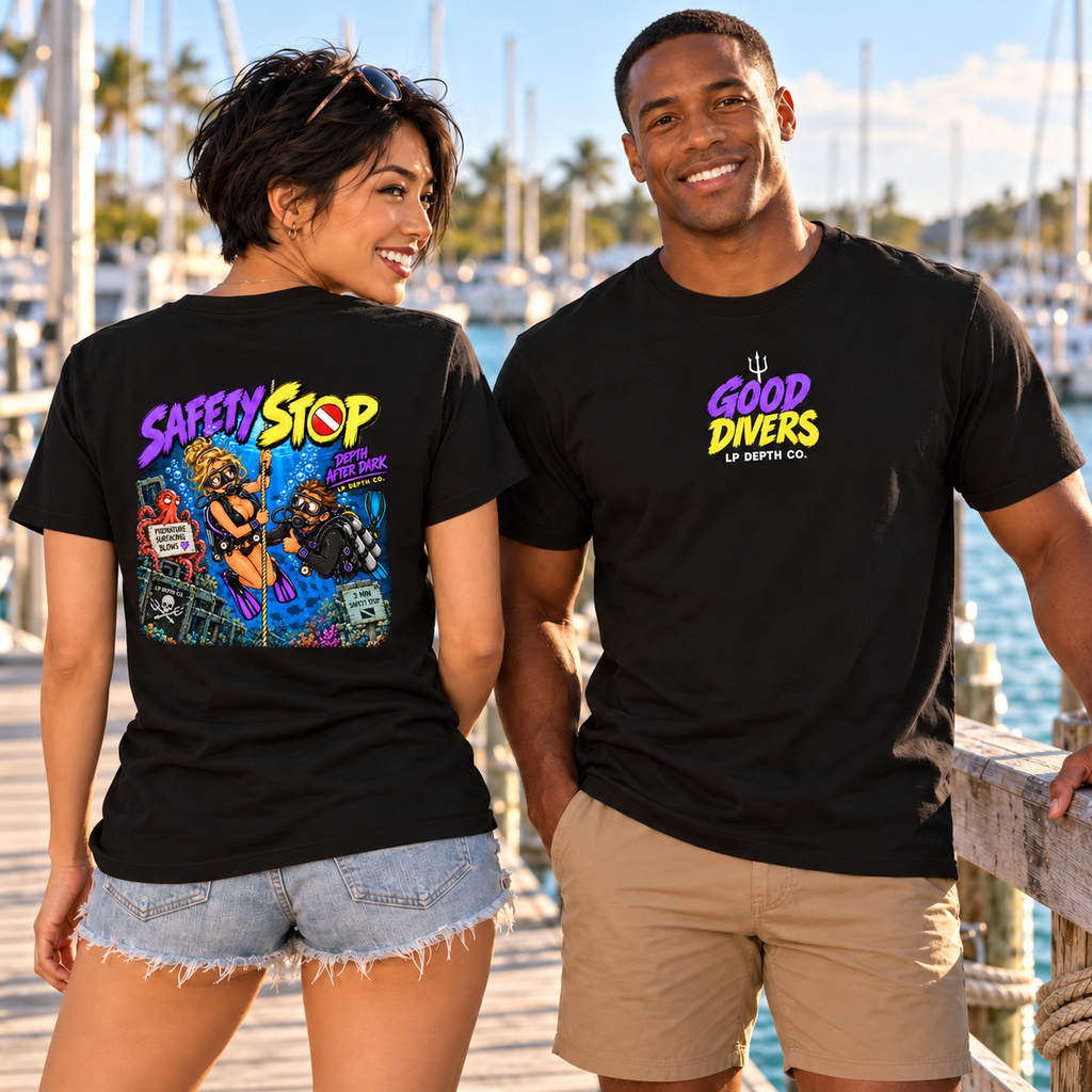 Good Divers Safety Stop black tee front and back with violet and yellow artwork at a marina