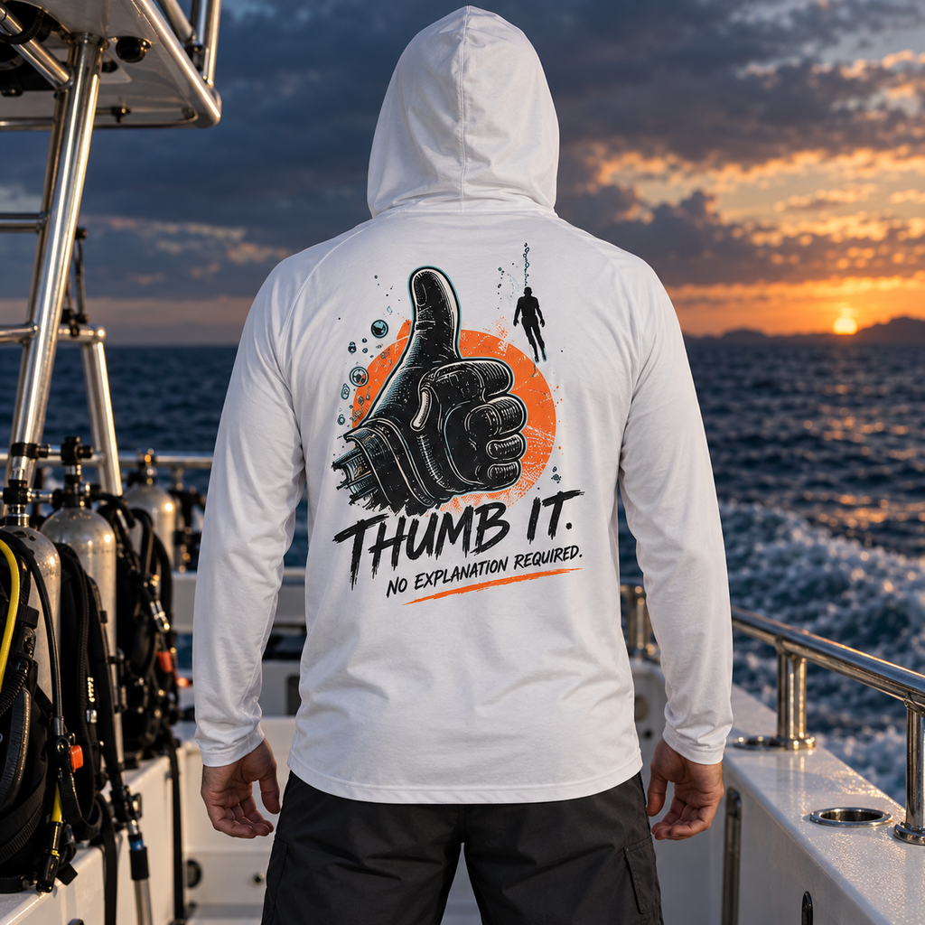 Thumb It. white lightweight sun hoodie back with a black scuba glove, orange circle, teal bubbles, and No Explanation Required lettering on a dive boat.